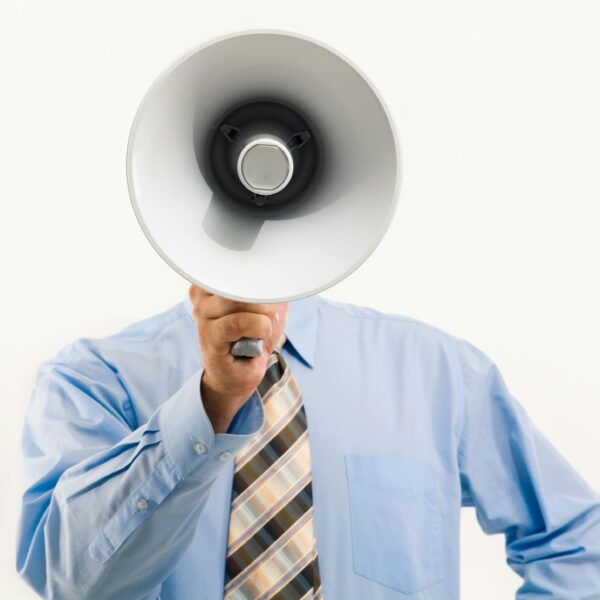 Man with megaphone representing an artificial voice box